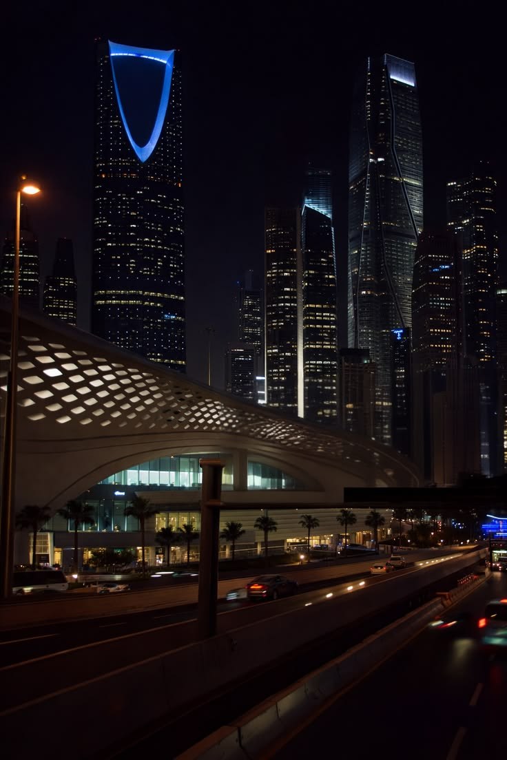 Riyadh's illuminated highway corridors and towers express a city where infrastructure, state ambition and real estate value move together.