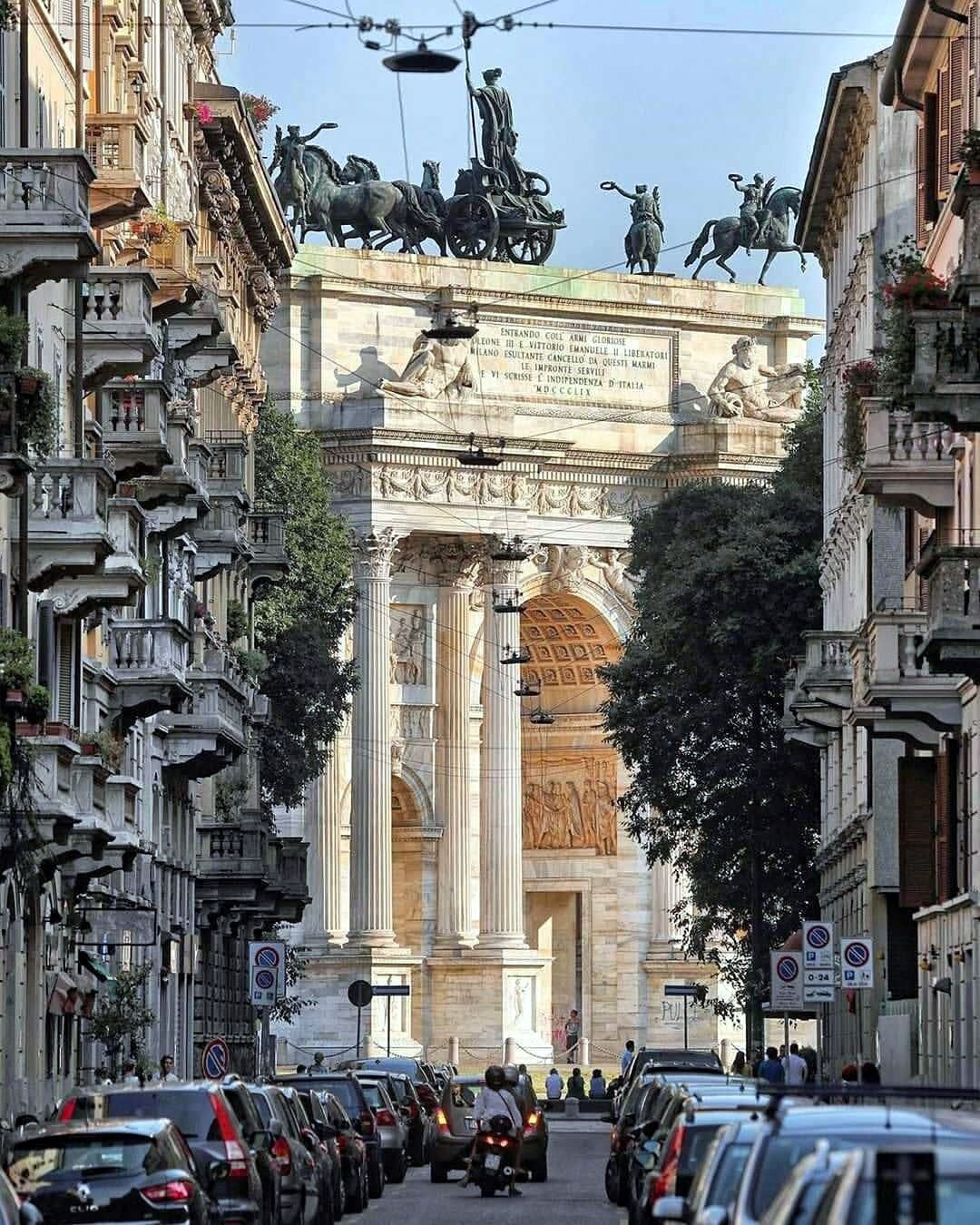 Milan's ceremonial axis: historic monumentality framed by everyday urban life.