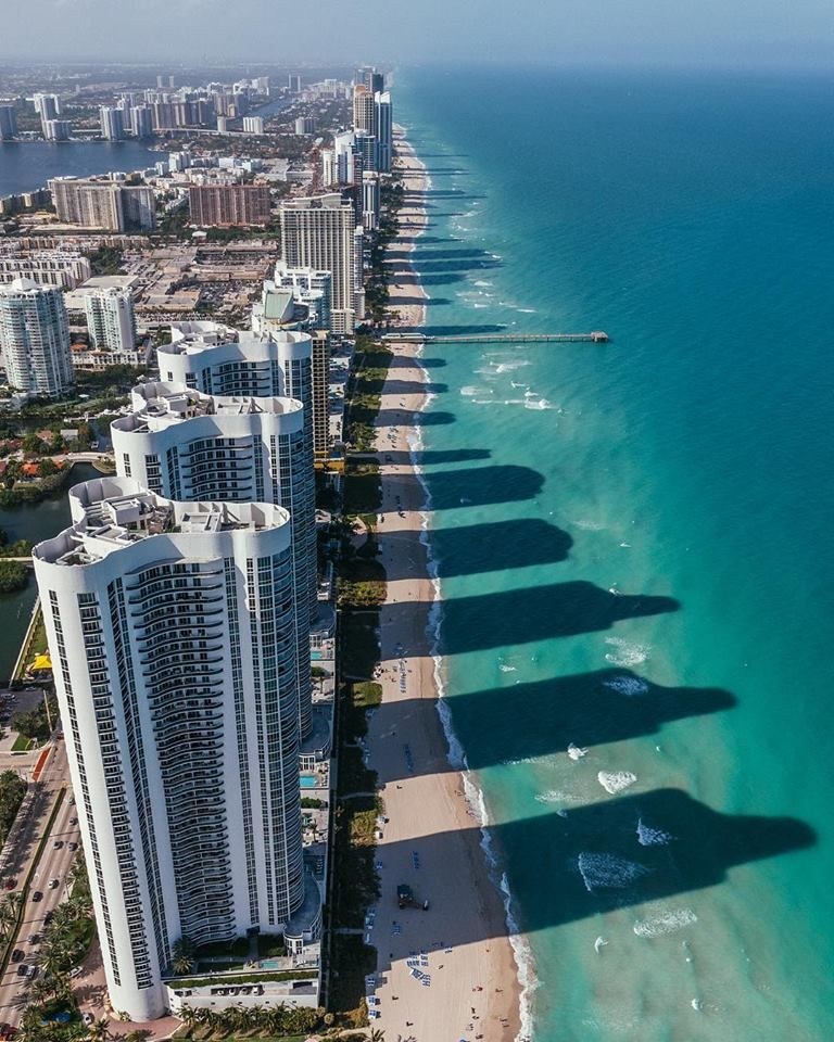 The shoreline premium: Miami's towers monetize the beach, but the same coastline carries long-term physical risk.