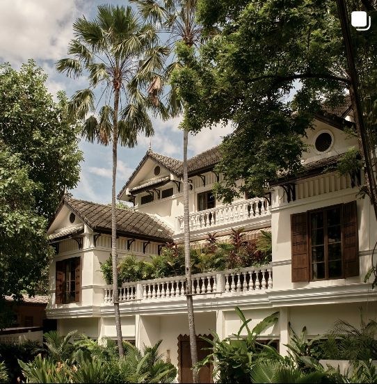A colonial house in tropical shade: Singapore's prestige is often found in the contrast between restraint and growth.