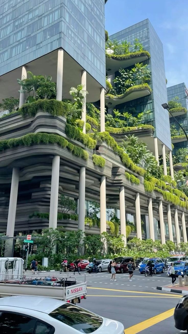 Vertical greenery softens density, turning tropical climate into a real-estate language of shade, prestige and controlled abundance.