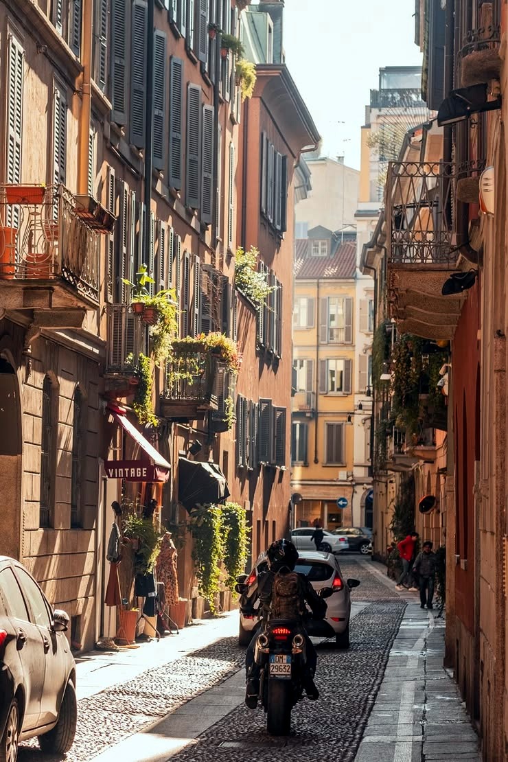 Warm residential streets turn domestic scale into cultural and financial value.