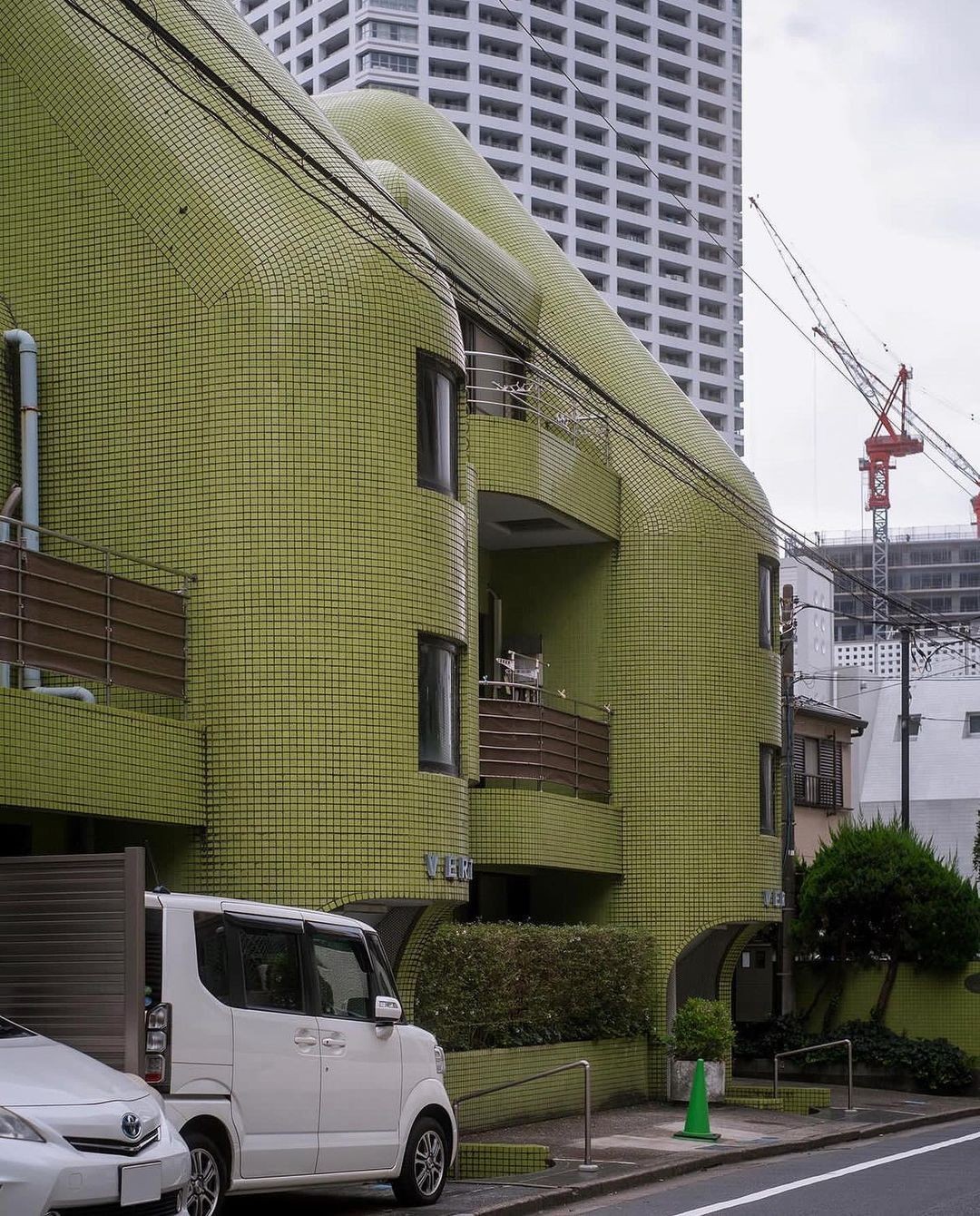 Soft geometry in a hard city: Tokyo real estate often finds value in character, not monumentality.